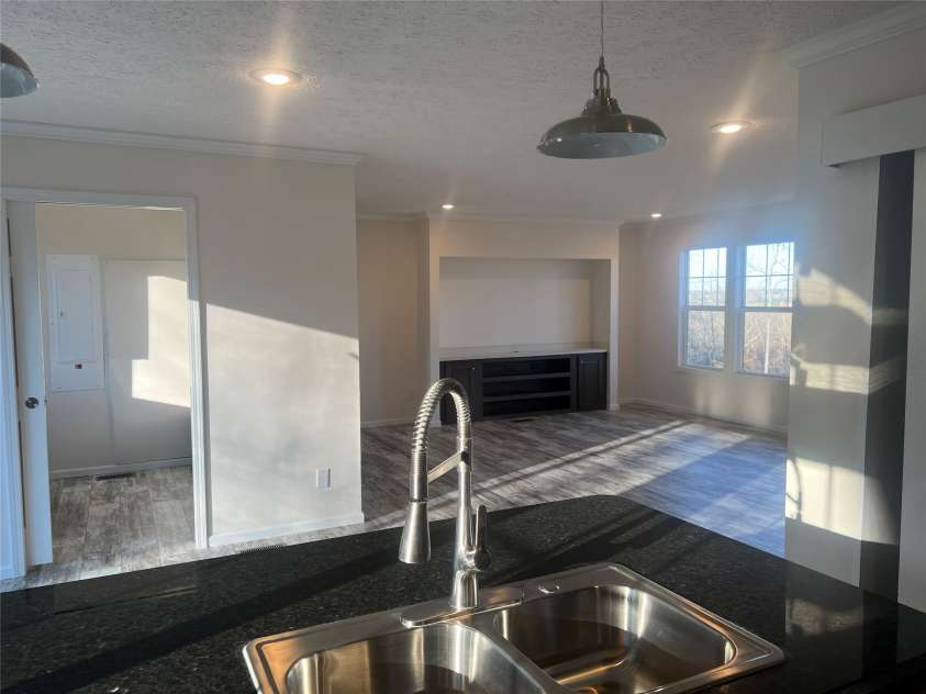 5748 Dalmatian Street, Iron Station, NC 28080.  MLS# CAR3927310, YatesRealty ID 1143. Kitchen to Great Room