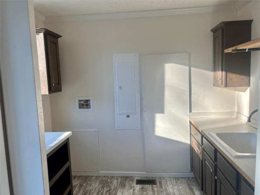 5748 Dalmatian Street, Iron Station, NC 28080.  MLS# CAR3927310, YatesRealty ID 1143. Laundry Room