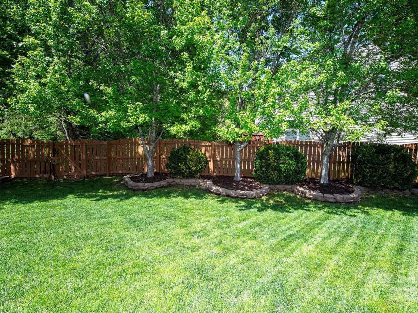 739 Ivy Trail Way, Fort Mill, SC 29715.  MLS# CAR4245330, YatesRealty ID 11431. Back Yard
