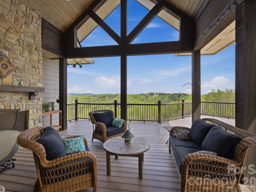 1638 Johns Ridge Parkway, Lenoir, NC 28645.  MLS# CAR4365169, YatesRealty ID 11432. Back Deck with Outdoor Fireplace