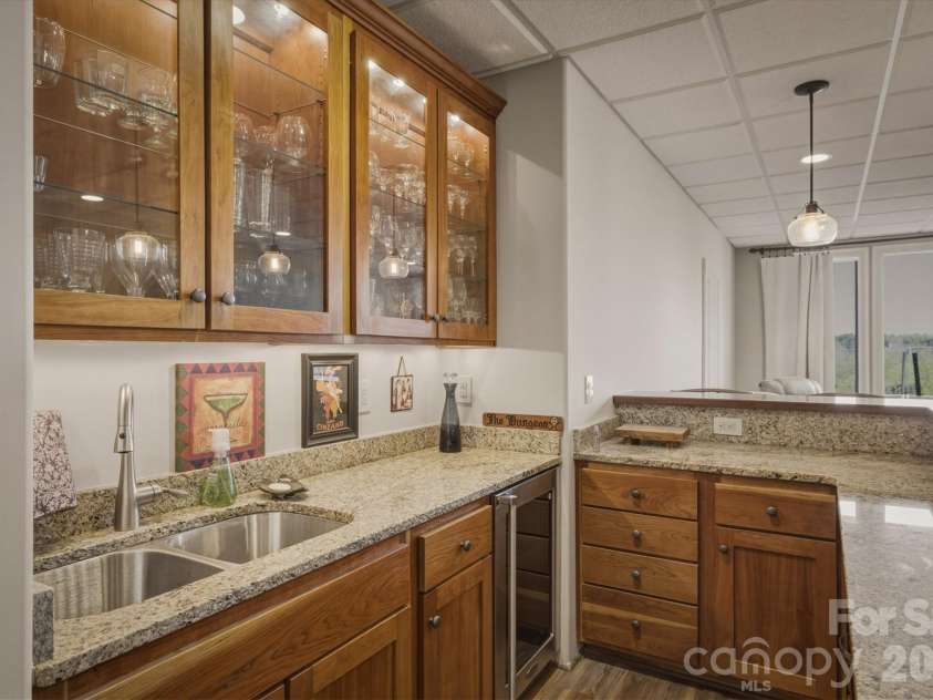 1638 Johns Ridge Parkway, Lenoir, NC 28645.  MLS# CAR4365169, YatesRealty ID 11432. Finished Basement Bar Area
