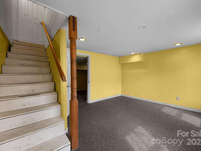 67 Montana Avenue, Asheville, NC 28806.  MLS# CAR4242878, YatesRealty ID 11433. Basement bedroom