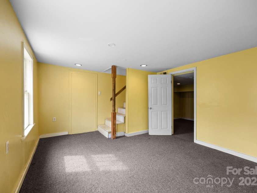 67 Montana Avenue, Asheville, NC 28806.  MLS# CAR4242878, YatesRealty ID 11433. Basement bedroom