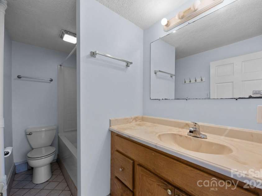 67 Montana Avenue, Asheville, NC 28806.  MLS# CAR4242878, YatesRealty ID 11433. First floor bathroom