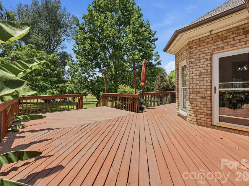 118 Broadbill Drive, Mooresville, NC 28117.  MLS# CAR4395594, YatesRealty ID 11435. Large rear deck.