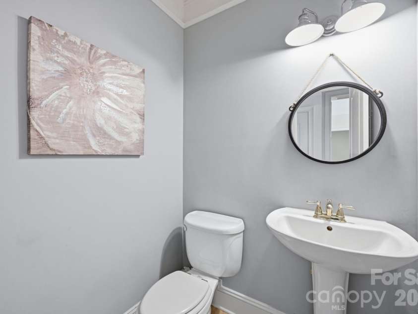 118 Broadbill Drive, Mooresville, NC 28117.  MLS# CAR4395594, YatesRealty ID 11435. Main level powder room.