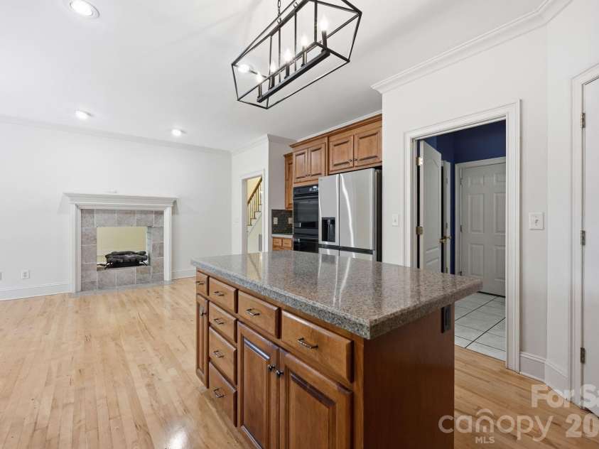 118 Broadbill Drive, Mooresville, NC 28117.  MLS# CAR4395594, YatesRealty ID 11435. See-through gas fireplace.