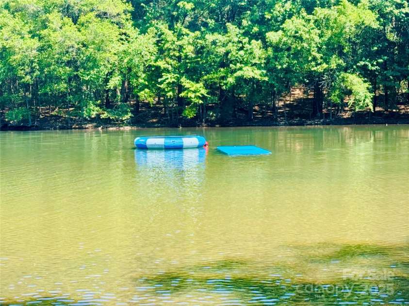 562 Amalfi Drive, Davidson, NC 28036.  MLS# CAR4243343, YatesRealty ID 11438. 