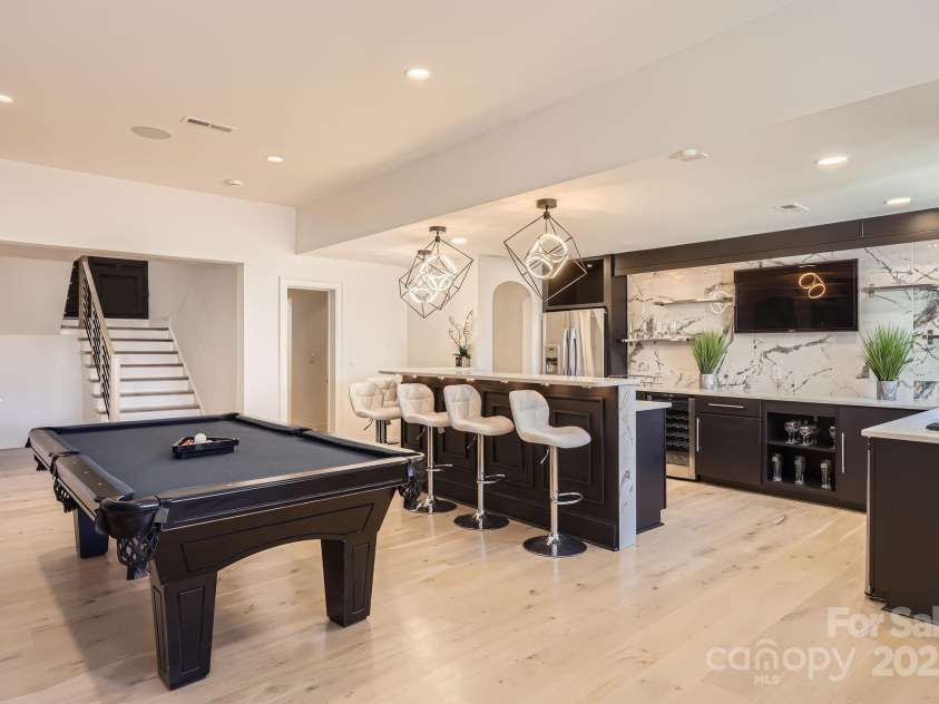 16744 Ashton Oaks Drive, Charlotte, NC 28278.  MLS# CAR4234987, YatesRealty ID 11439. Basement Entertainment area