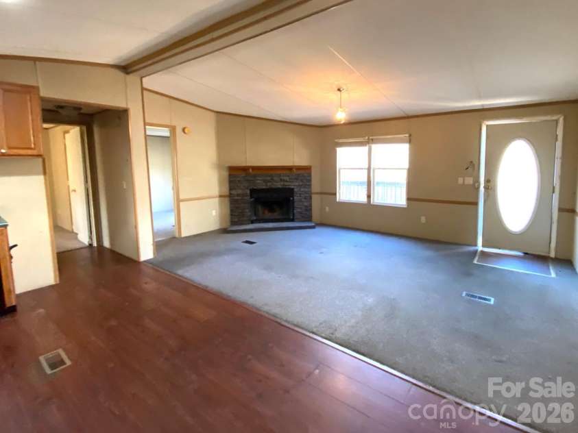 16 Molly Lane, Candler, NC 28715.  MLS# CAR4358310, YatesRealty ID 11445. 
