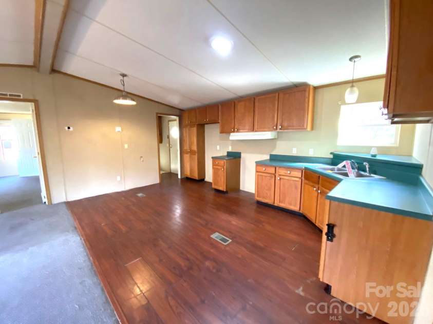 16 Molly Lane, Candler, NC 28715.  MLS# CAR4358310, YatesRealty ID 11445. 