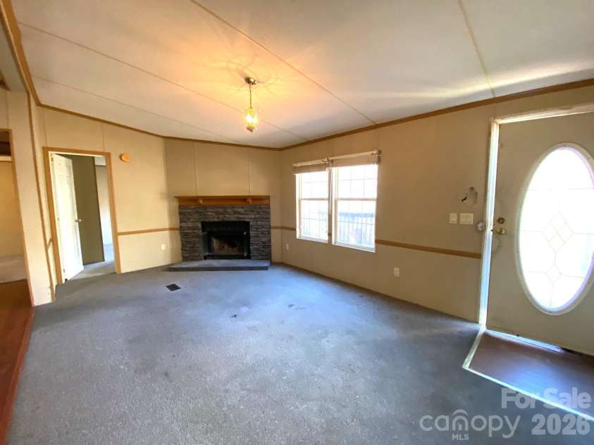 16 Molly Lane, Candler, NC 28715.  MLS# CAR4358310, YatesRealty ID 11445. 