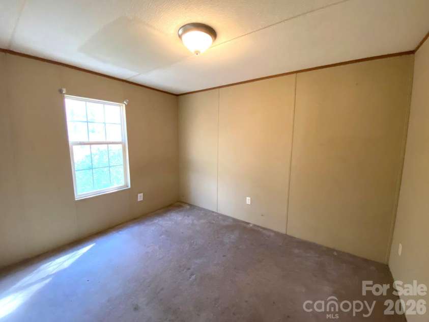 16 Molly Lane, Candler, NC 28715.  MLS# CAR4358310, YatesRealty ID 11445. 