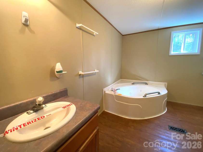 16 Molly Lane, Candler, NC 28715.  MLS# CAR4358310, YatesRealty ID 11445. 