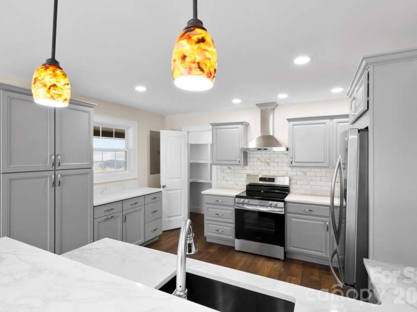 362 Gray Fox Road, Rosman, NC 28772.  MLS# CAR4366224, YatesRealty ID 11447. Gorgeous remodeled kitchen!