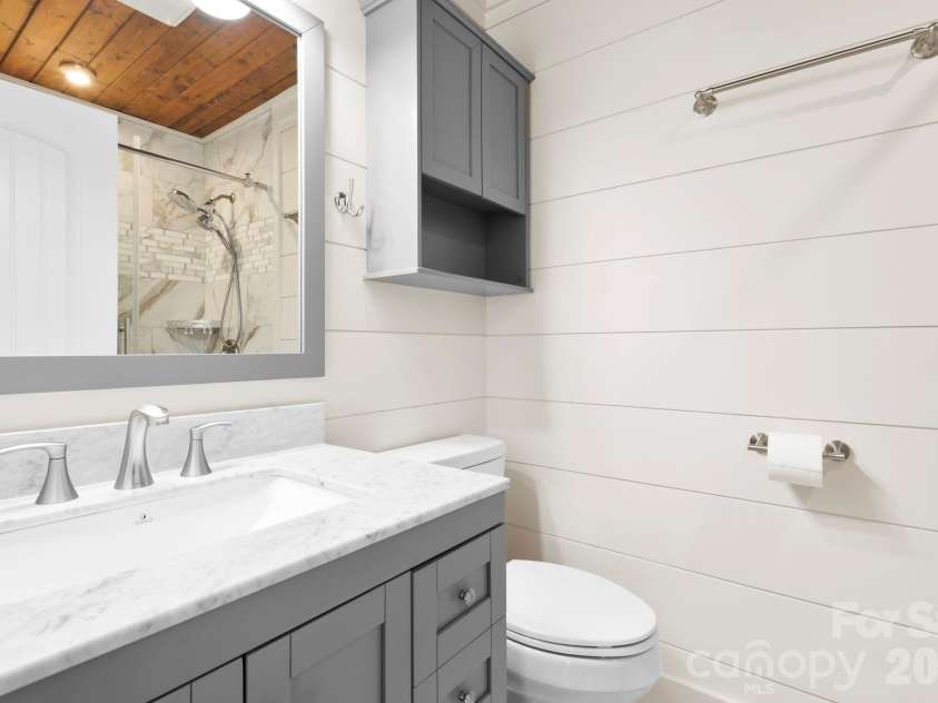362 Gray Fox Road, Rosman, NC 28772.  MLS# CAR4366224, YatesRealty ID 11447. Guest Bathroom!