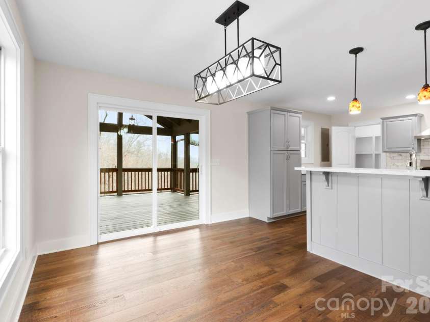 362 Gray Fox Road, Rosman, NC 28772.  MLS# CAR4366224, YatesRealty ID 11447. Large dining space off from kitchen!
