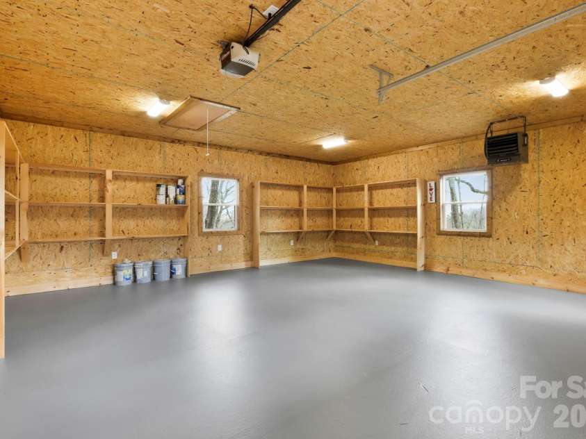362 Gray Fox Road, Rosman, NC 28772.  MLS# CAR4366224, YatesRealty ID 11447. Large workshop with heater!