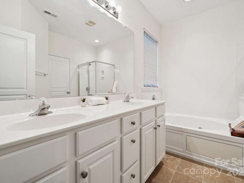 8408 Brookings Drive, Charlotte, NC 28269.  MLS# CAR4284673, YatesRealty ID 1145. Ensuite with dual vanity