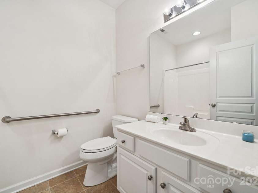 8408 Brookings Drive, Charlotte, NC 28269.  MLS# CAR4284673, YatesRealty ID 1145. Full bathroom with a hand rail