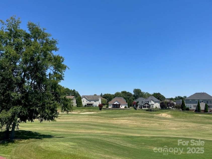 8408 Brookings Drive, Charlotte, NC 28269.  MLS# CAR4284673, YatesRealty ID 1145. Gorgeous view of the 14th hole from the balcony!