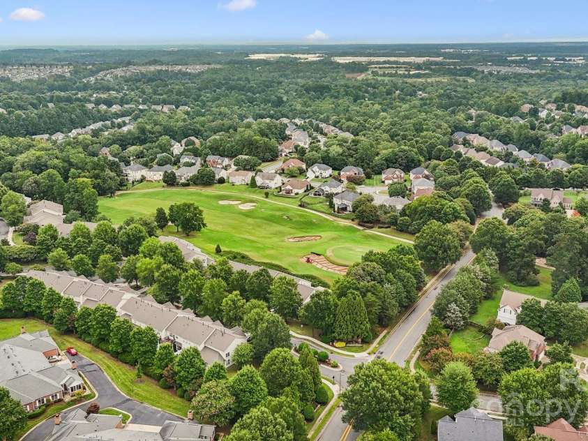 8408 Brookings Drive, Charlotte, NC 28269.  MLS# CAR4284673, YatesRealty ID 1145. The view off the 14th hole in the Highland Creek Golf Course community.