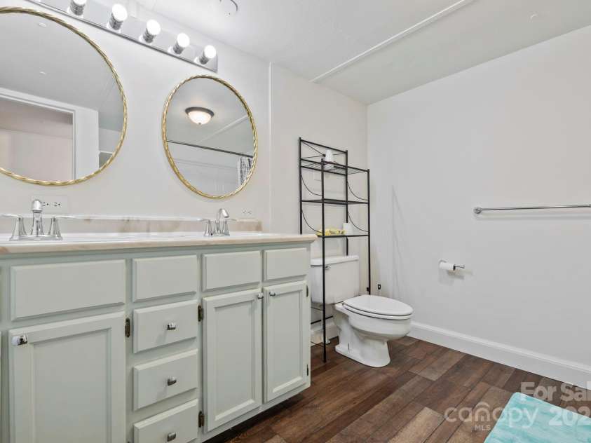 456 Newtown Road, Rosman, NC 28772.  MLS# CAR4249436, YatesRealty ID 11452. Newly updated bathroom.