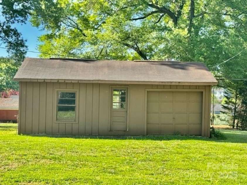 127 Edgeway Road, Mooresville, NC 28117.  MLS# CAR4248332, YatesRealty ID 11453. Storage building