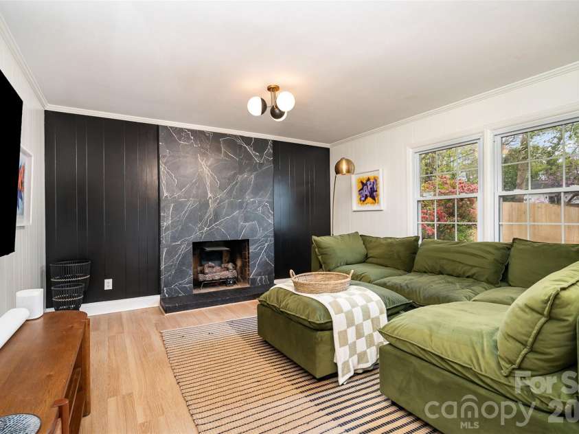 3524 Donovan Place, Charlotte, NC 28215.  MLS# CAR4333901, YatesRealty ID 11456. Downstairs Living Room