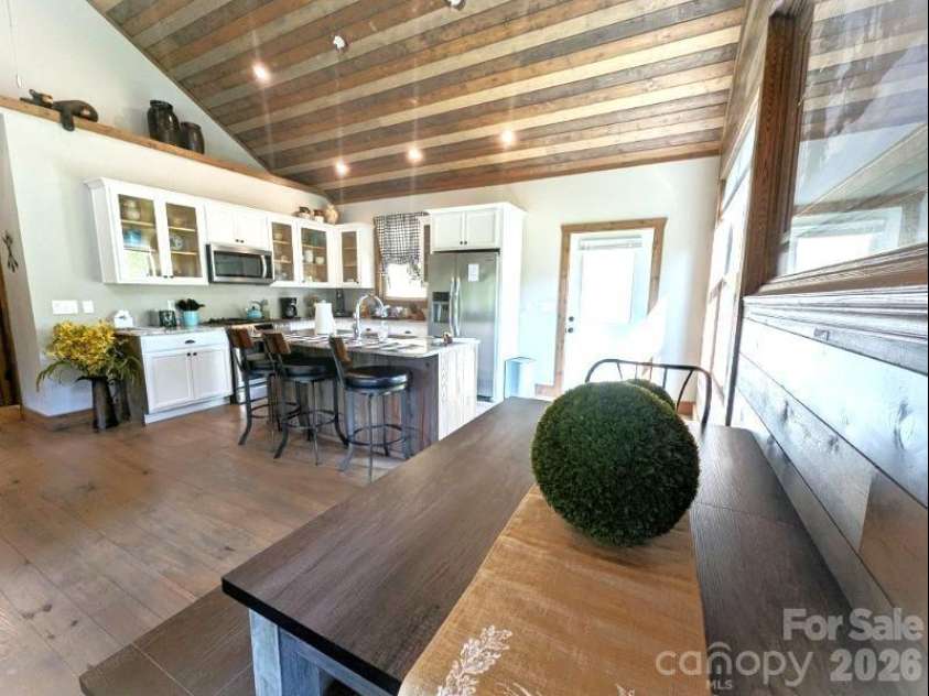 10 Rio Bravo Drive, Sylva, NC 28779.  MLS# CAR4296478, YatesRealty ID 1146. Dining to Kitchen