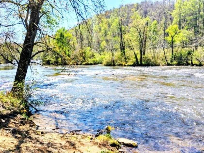 10 Rio Bravo Drive, Sylva, NC 28779.  MLS# CAR4296478, YatesRealty ID 1146. Time to fish the Tuckasegee River