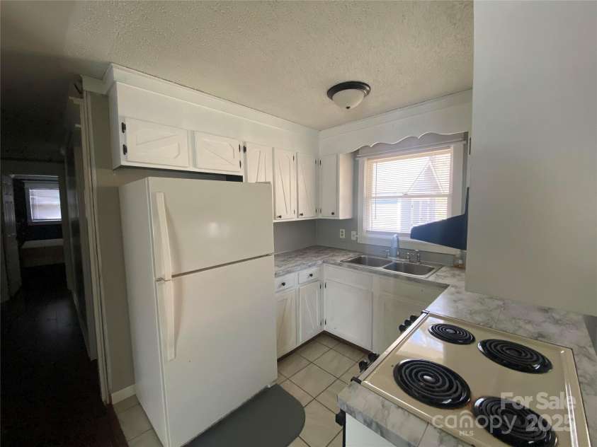 406 Sam J Byrd Road, Burnsville, NC 28714.  MLS# CAR4243767, YatesRealty ID 11462. 