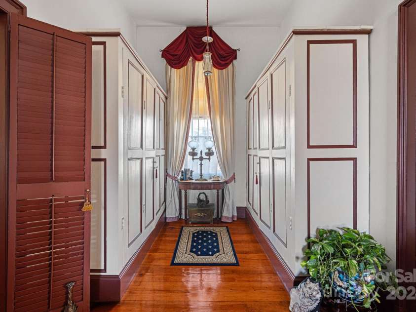 104 Leslie Loop, Mooresville, NC 28115.  MLS# CAR4195674, YatesRealty ID 11464. Built-in armoires make great storage!