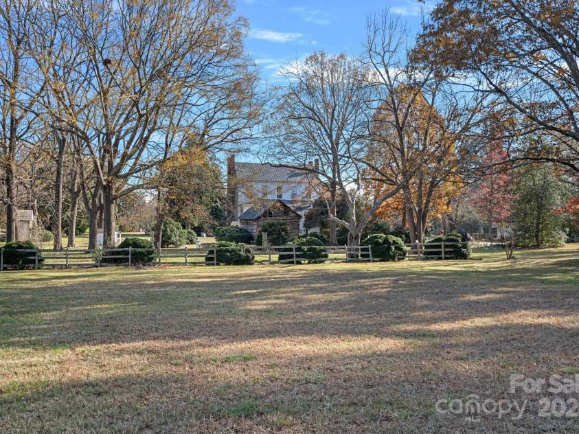 104 Leslie Loop, Mooresville, NC 28115.  MLS# CAR4195674, YatesRealty ID 11464. Property is level and has lots of native perennials!