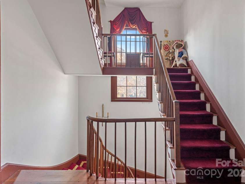 104 Leslie Loop, Mooresville, NC 28115.  MLS# CAR4195674, YatesRealty ID 11464. Steps to Attic on the third floor