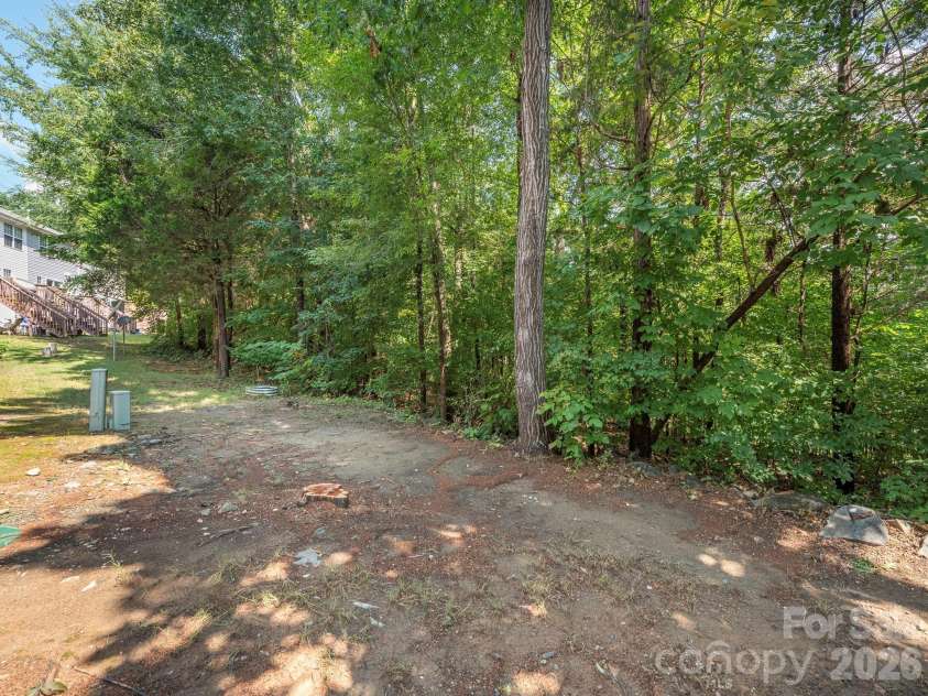 1554 Maypine Commons Way, Rock Hill, SC 29732.  MLS# CAR4369109, YatesRealty ID 11467. Tree-lined backyard