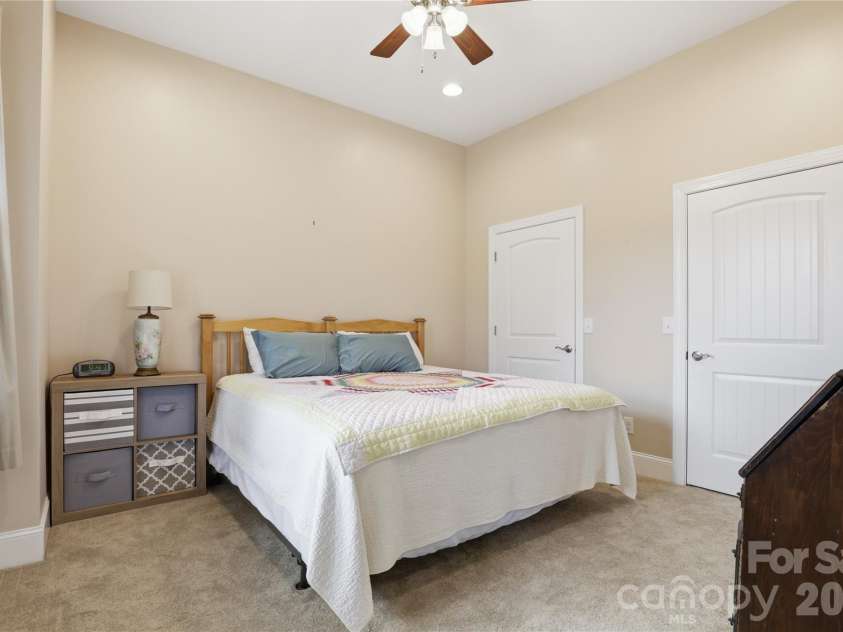 1084 Rocky Headwaters Road, Moravian Falls, NC 28654.  MLS# CAR4360942, YatesRealty ID 11468. Lower Level Bedroom 