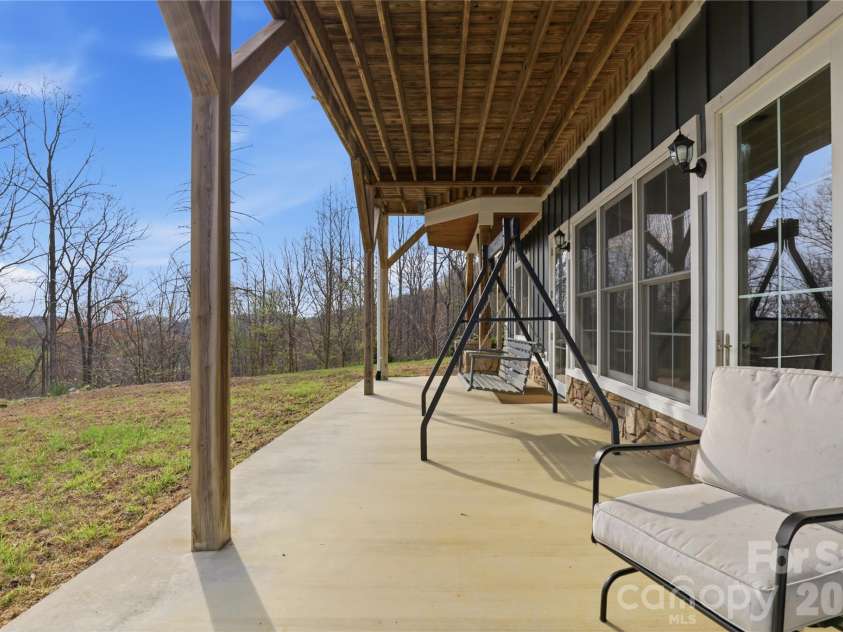 1084 Rocky Headwaters Road, Moravian Falls, NC 28654.  MLS# CAR4360942, YatesRealty ID 11468. Lower Level Patio
