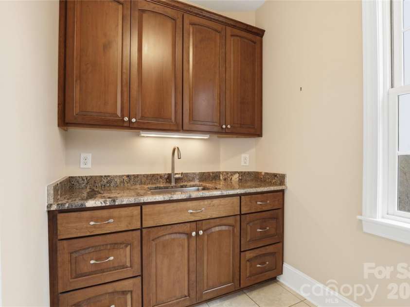 1084 Rocky Headwaters Road, Moravian Falls, NC 28654.  MLS# CAR4360942, YatesRealty ID 11468. Main Level Laundry