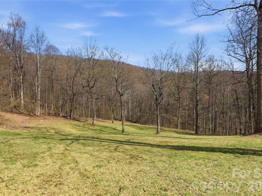 1084 Rocky Headwaters Road, Moravian Falls, NC 28654.  MLS# CAR4360942, YatesRealty ID 11468. Meadow