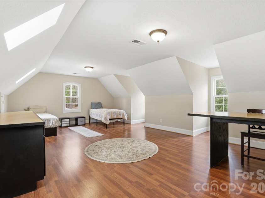 1084 Rocky Headwaters Road, Moravian Falls, NC 28654.  MLS# CAR4360942, YatesRealty ID 11468. Upper Level Bonus Room