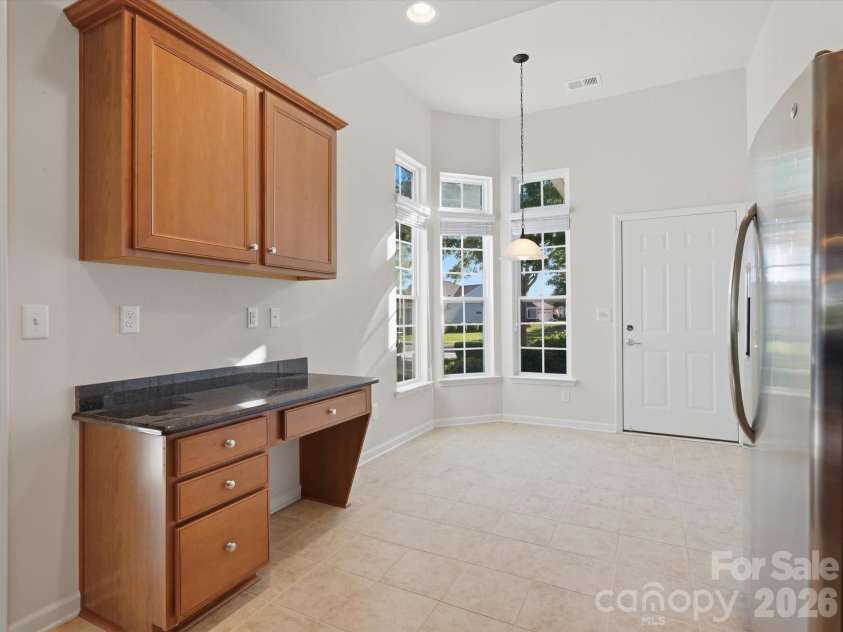 3918 Yosemite Way, Fort Mill, SC 29707.  MLS# CAR4363028, YatesRealty ID 11469. Breakfast nook and workstation in kitchen