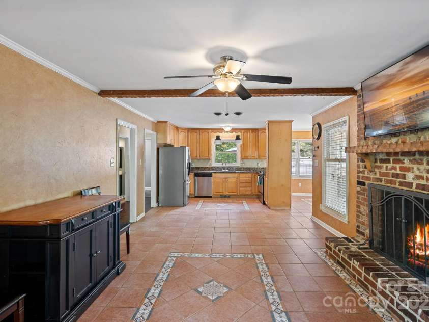 836 Meadowlark Drive, Rock Hill, SC 29732.  MLS# CAR4250285, YatesRealty ID 11471. Den and Kitchen