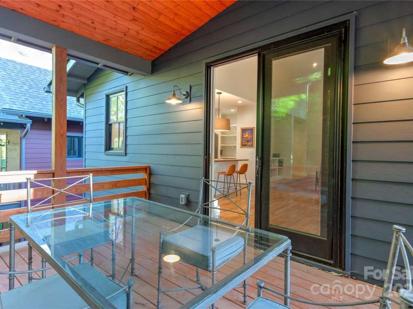 12 Waverly Road, Asheville, NC 28803.  MLS# CAR4256160, YatesRealty ID 11477. Back covered porch