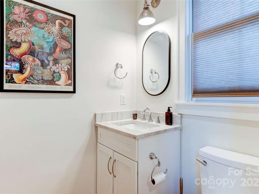 12 Waverly Road, Asheville, NC 28803.  MLS# CAR4256160, YatesRealty ID 11477. Powder room with marble and tile