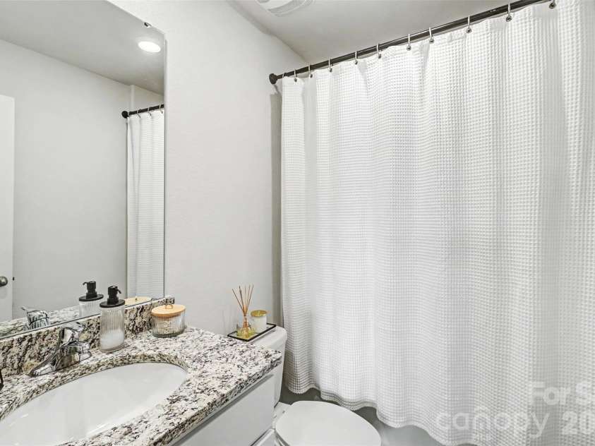 2215 Transatlantic Avenue, Charlotte, NC 28215.  MLS# CAR4349079, YatesRealty ID 11478. Guest bath