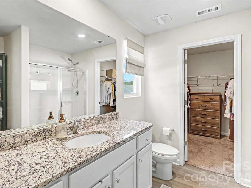 2215 Transatlantic Avenue, Charlotte, NC 28215.  MLS# CAR4349079, YatesRealty ID 11478. Primary bathroom