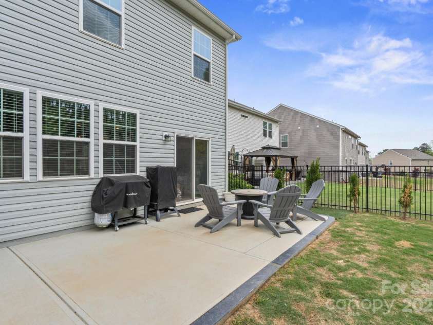 121 Little Kennerly Drive, Mooresville, NC 28115.  MLS# CAR4241437, YatesRealty ID 11479. Lots of space for outdoor entertaining on the patio.