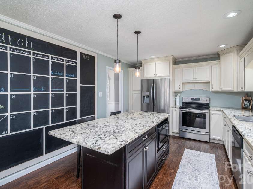 4804 Cedar Court, Gastonia, NC 28056.  MLS# CAR4356344, YatesRealty ID 11483. Fun chalk wall to keep your schedule!