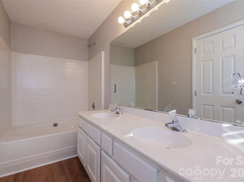 5022 Silabert Avenue, Charlotte, NC 28205.  MLS# CAR4367663, YatesRealty ID 11485. Upper bath